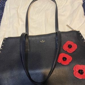 Kate Spade leather poppy bag with gold studding.